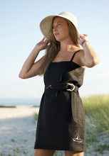 Load image into Gallery viewer, Black Linen Spaghetti Beach dress with nautical embroidery detail
